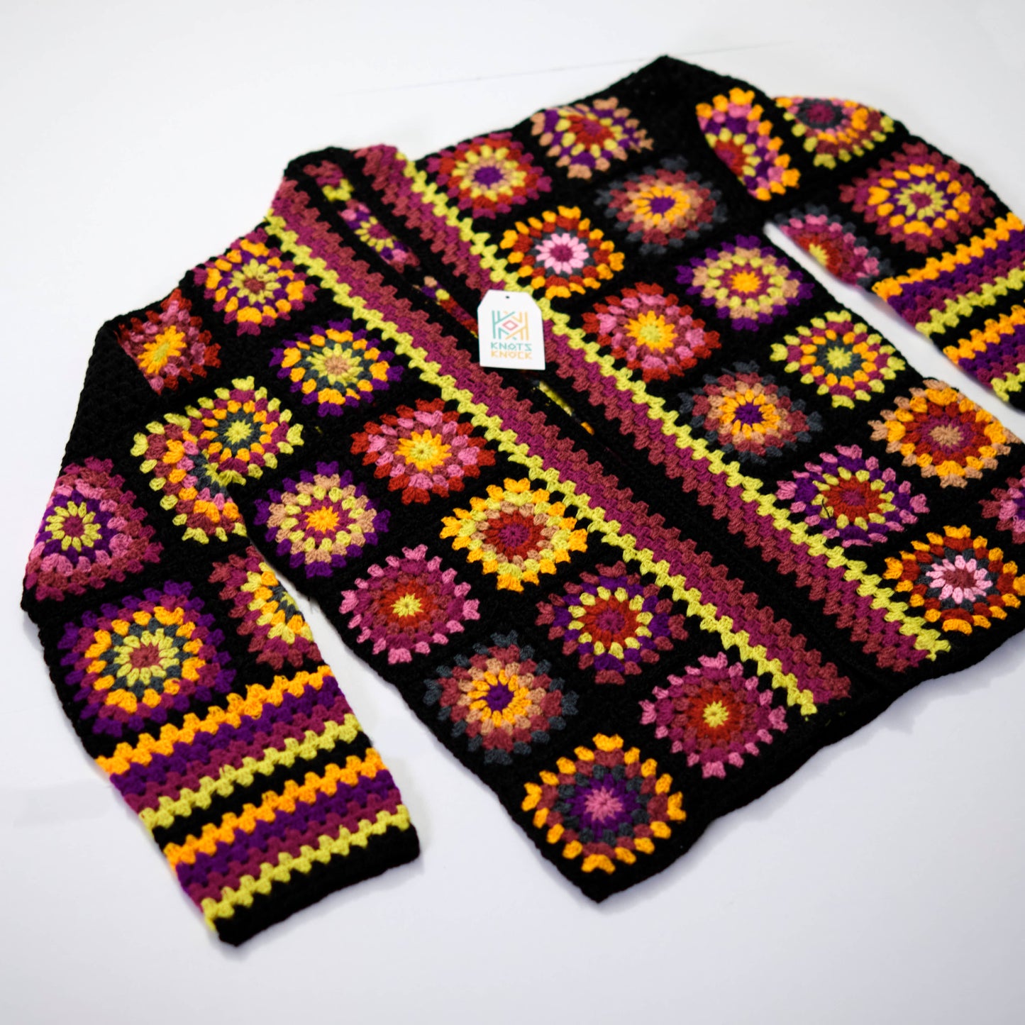 Black Granny Square Crochet Cardigan with Vibrant Floral Centers